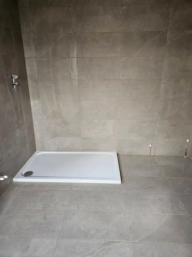 Bathroom tiling in Swansea: grey