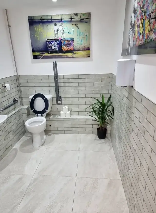Bathroom tiling in Swansea: grey white brickeffect small