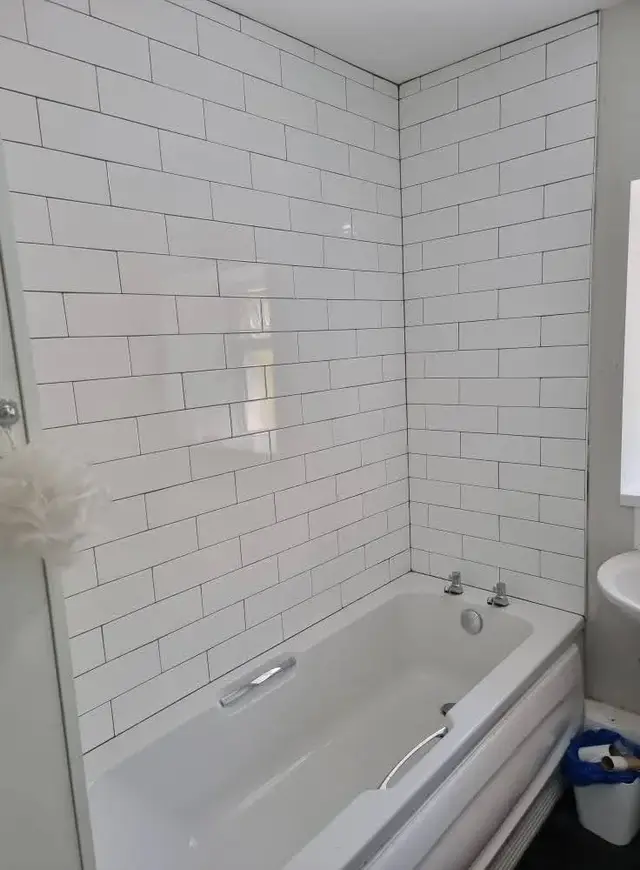Bathroom tiling in Swansea: white brick full