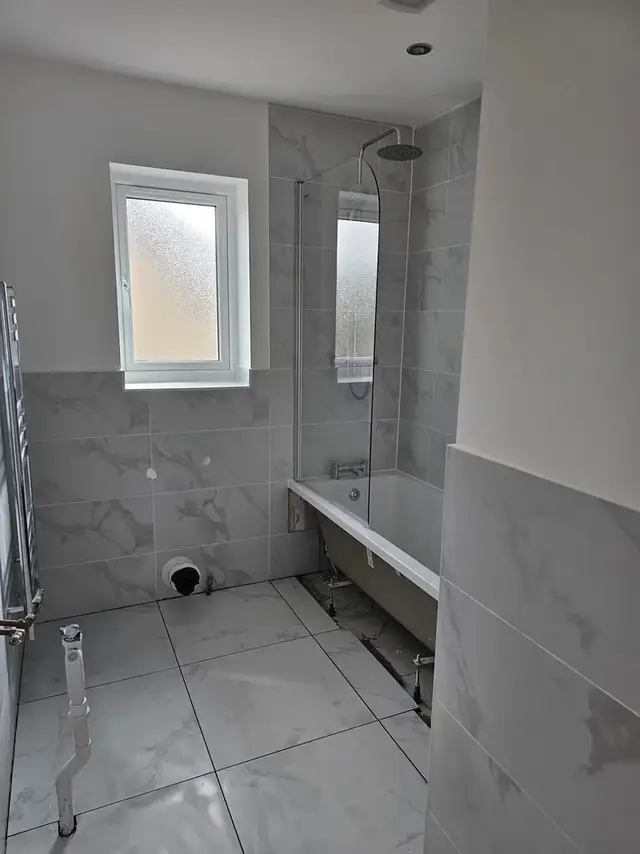 Bathroom tiling in Swansea: grey