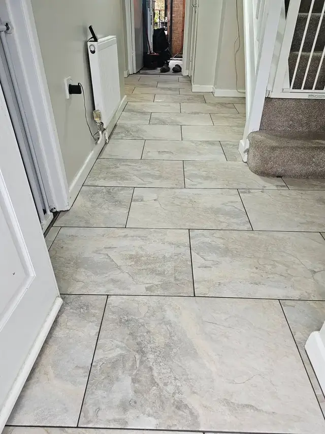 Floor tiling in Swansea: white brickeffect