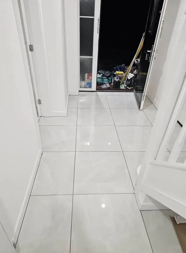 Floor tiling in Swansea: white hallway