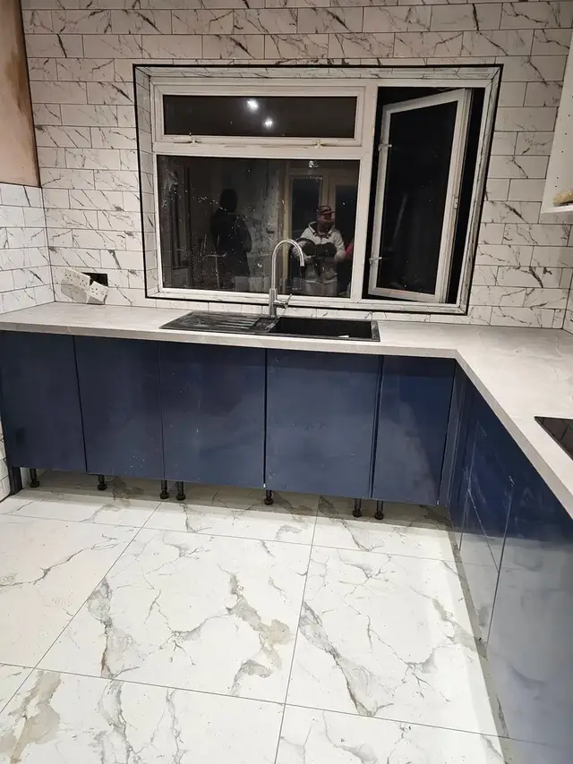 Kitchen tiling in Swansea: white floor and walls