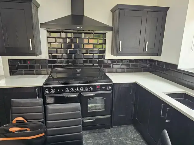 Kitchen tiling in Swansea: black brick tiles